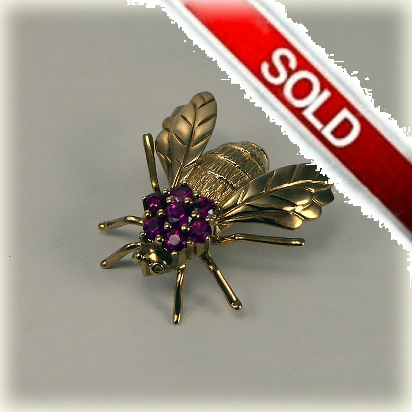 Ruby Stone Brooch 9ct gold 7-stone Ruby Bee Brooch | Mr Allan Jewellers